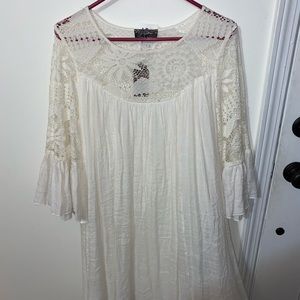 White lace dress with bell sleeves